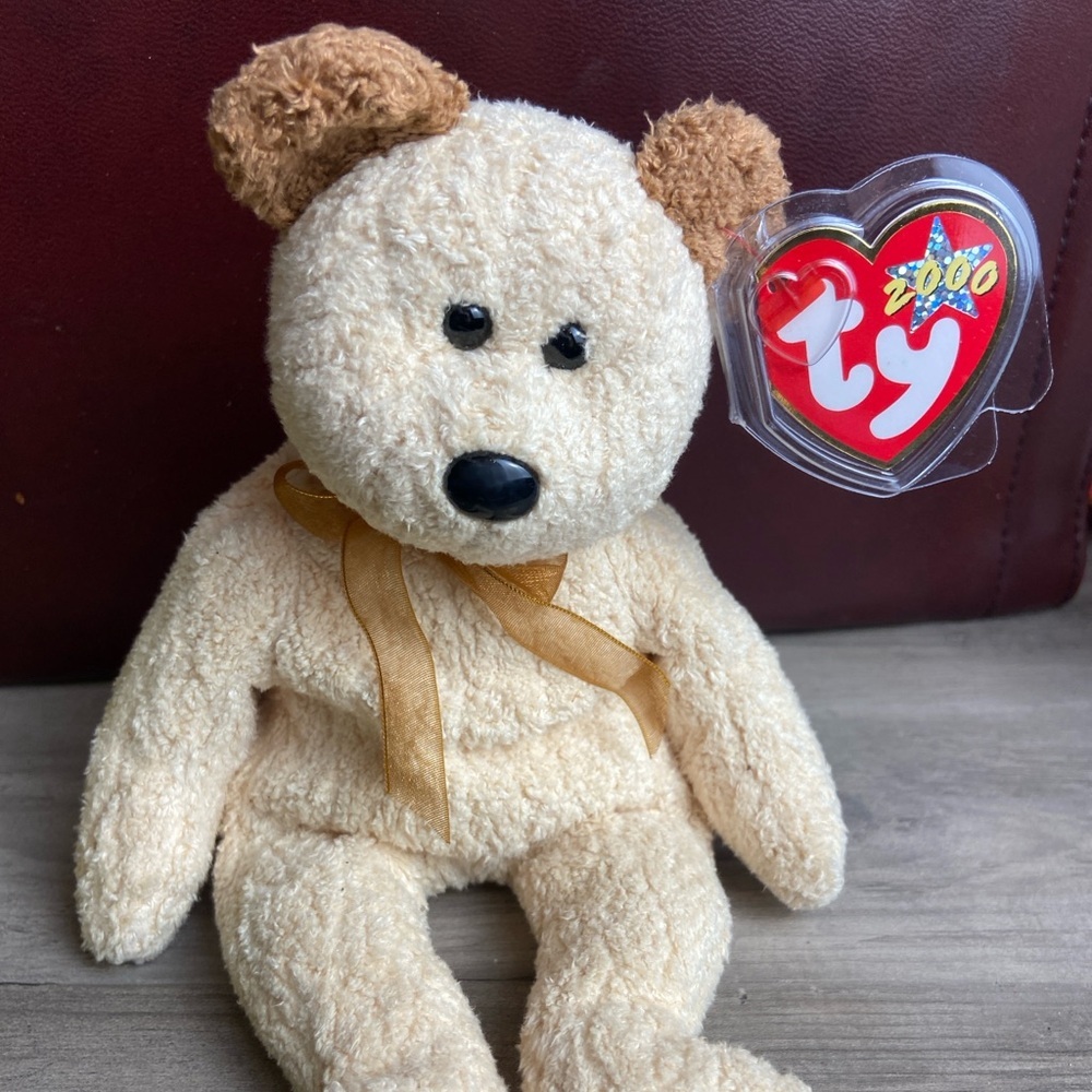 Ty Beanie Baby named Huggy the Bear, released in 2000, NWT